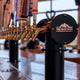 LED backlit laser cut logo on a beer tower