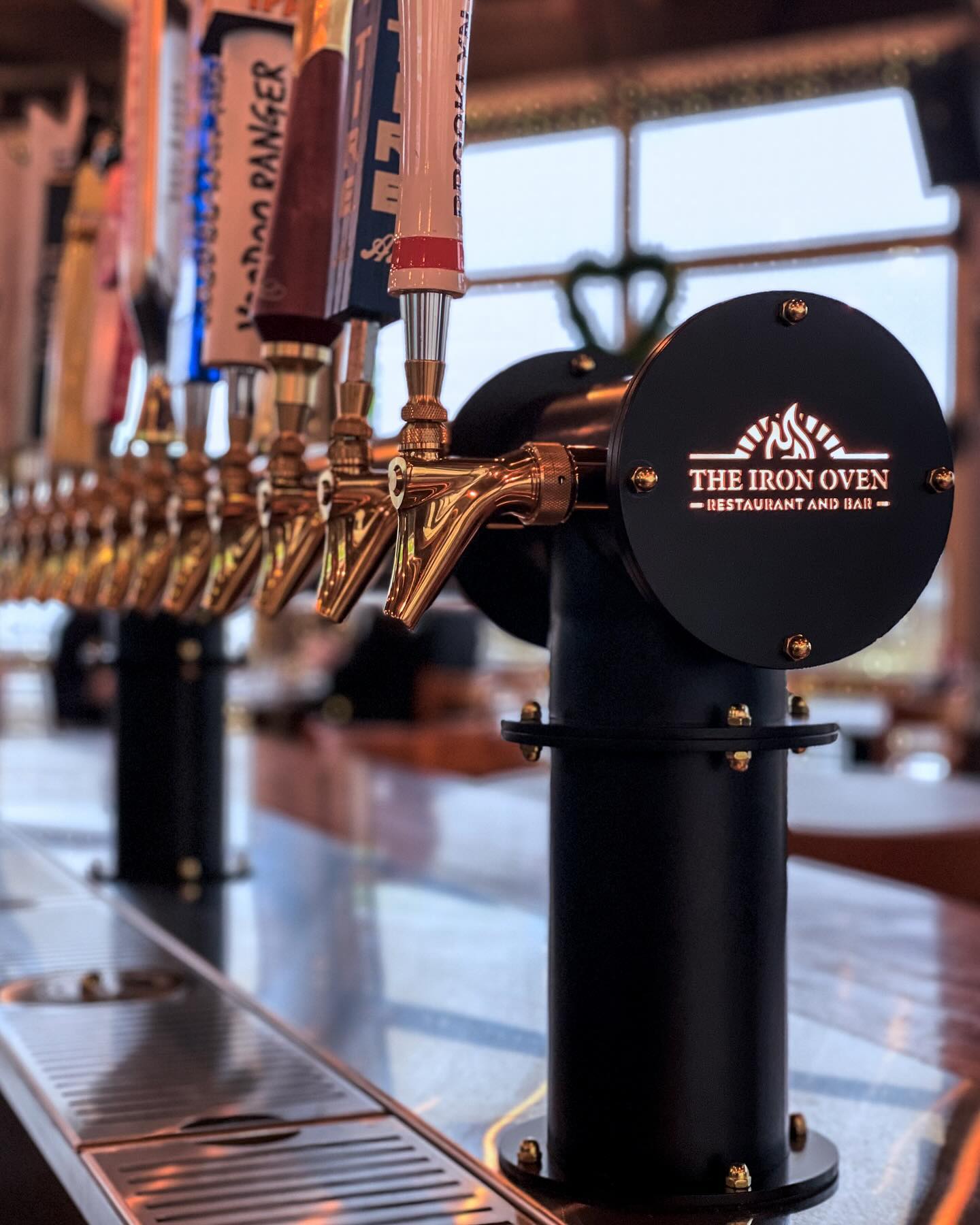 LED backlit laser cut logo on a beer tower